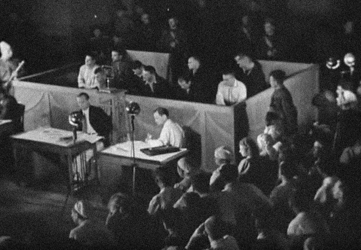The accused during the Krasnodar Trial, July 14-18, 1943; still from ‘The Verdict of the People’ (1943)