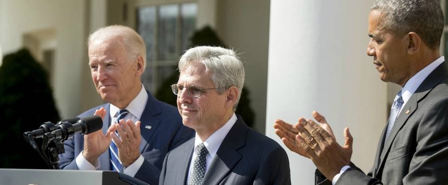 President Barack Obama and Vice President Joe Biden applaud US Supreme Court nominee, Judge Merrick Garland, during the nomination announcement in the Rose Garden of the White House in Washington, D.C., March 16, 2016. 