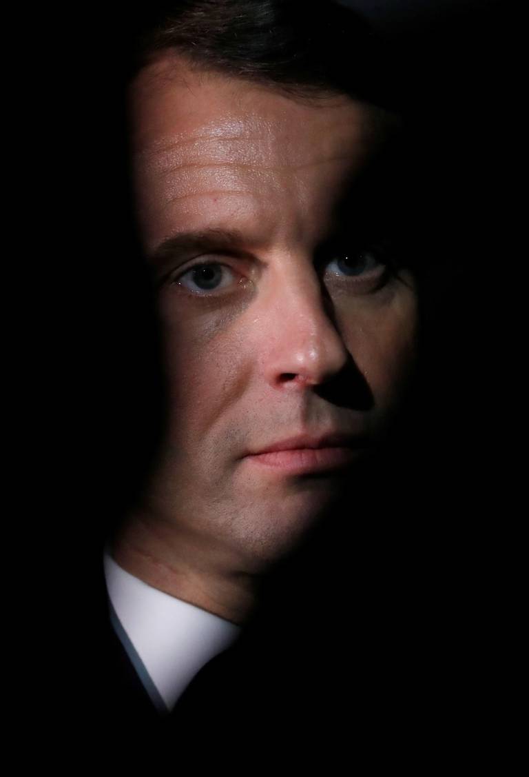 Emmanuel Macron talks to the media as he leaves Downing Street in London after attending talks with Britain's prime minister ahead of the NATO alliance summit, on Dec. 3, 2019