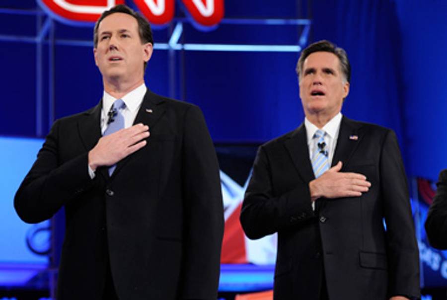Rick Santorum and Mitt Romney last night at the debate.(Ethan Miller/Getty Images)