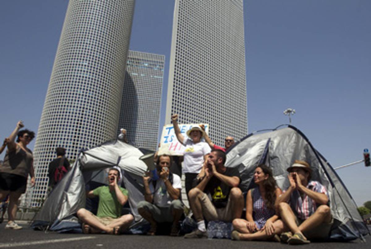 Protesters, and their tents, in Tel Aviv. (Jack Guez/AFP/Getty Images)
