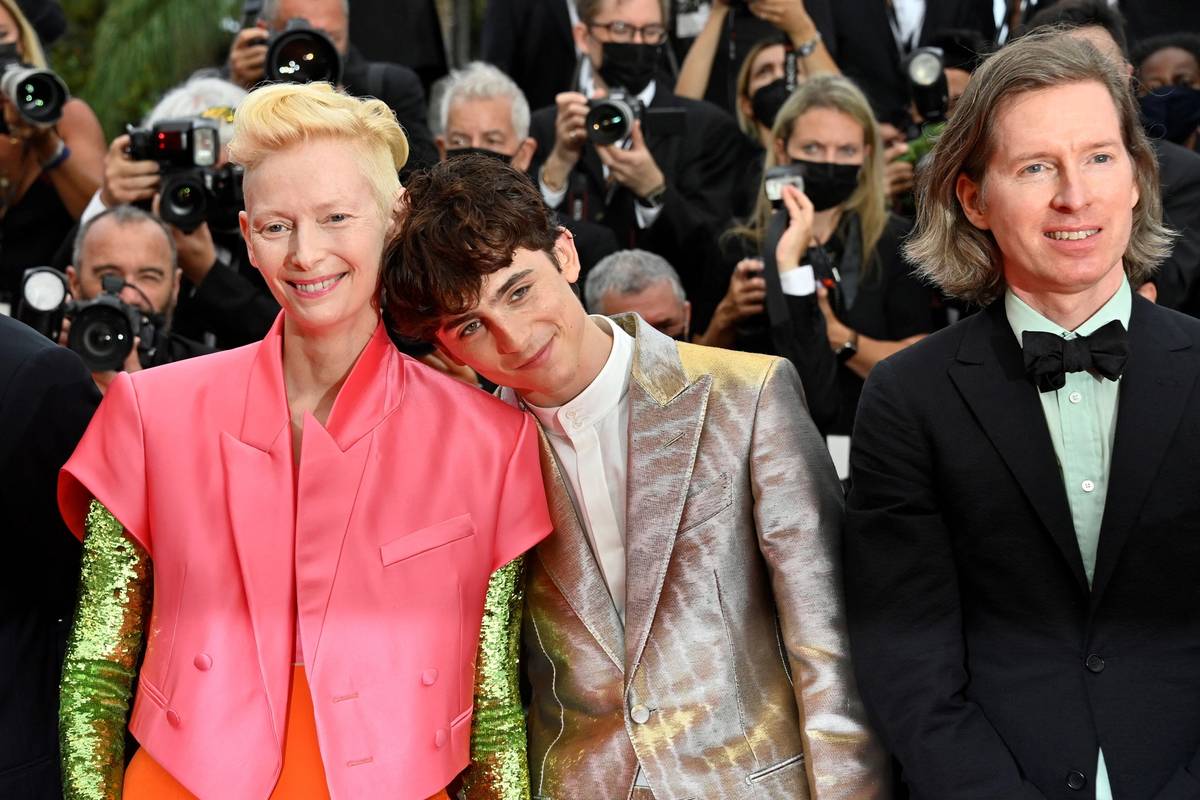 British actress Tilda Swinton, French-U.S. actor Timothee Chalamet, and U.S. director Wes Anderson pose as they arrive for the screening of the film ‘The French Dispatch’ at the 74th edition of the Cannes Film Festival in France, on July 12, 2021
