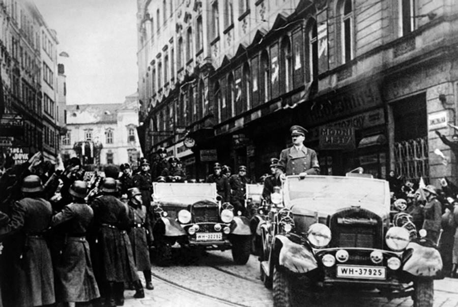 German nazi Chancellor Adolf Hitler and his army parade in Prague on March 15, 1939, the day of the invasion of Czechoslovakia by the Wehrmacht. (-/AFP/Getty Images)