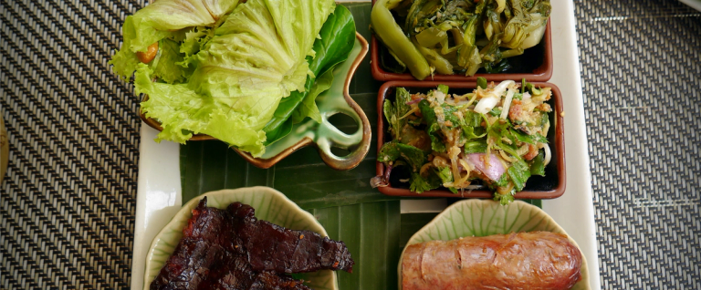 Lao cuisine: sticky rice, BBQ meat, And laap