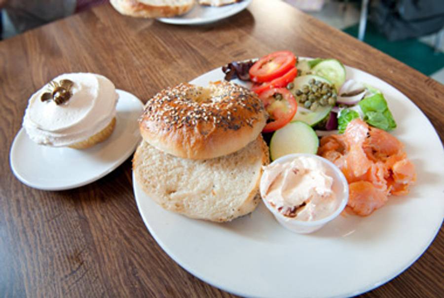 Breakfast at Cake Café in New Orleans: a cupcake and an everything bagel with lox.(© Kyle Petrozza)