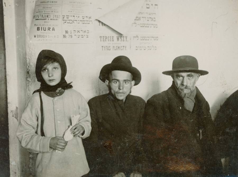 This 1921 photograph shows three starving Jewish refugees in Rowne, Poland, (present-day Rovno or Rivne, Ukraine). In addition to the widespread displacement, famine, disease, and economic hardship that existed in the aftermath of World War I, the Jewish populations of Eastern Europe underwent new suffering as a result of the Russian Revolution and subsequent civil war. Rowne, a commercial hub with a large Jewish population, was among the towns visited by the first team of field representatives sent to Poland by the American Jewish Joint Distribution Committee (JDC). Such teams included social workers, physicians, and teachers. The JDC was founded by American Jews in New York City in 1914 to provide wartime relief to Jewish communities.