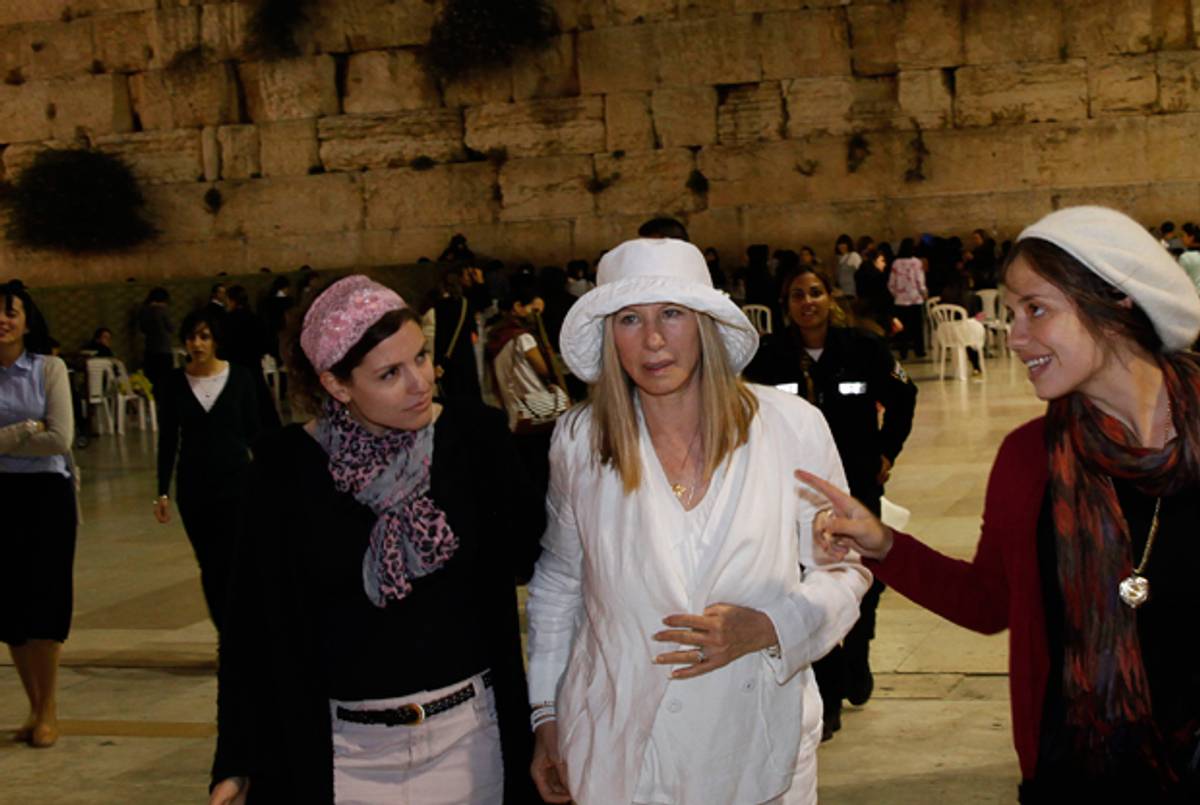 Jewish-American superstar Barbra Streisand visits the Western Wall, Judaism holiest site in Jerusalem's Old City on June 16, 2013. (GALI TIBBON/AFP/Getty Images)