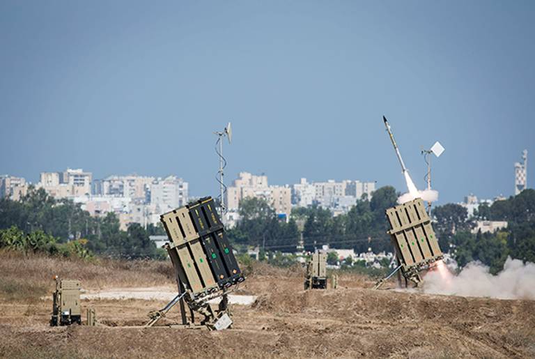 The Iron Dome air-defense system fires to intercept a rocket over the city of Ashdod on July 8, 2014, in Ashdod, Israel. (Ilia Yefimovich/Getty Images)