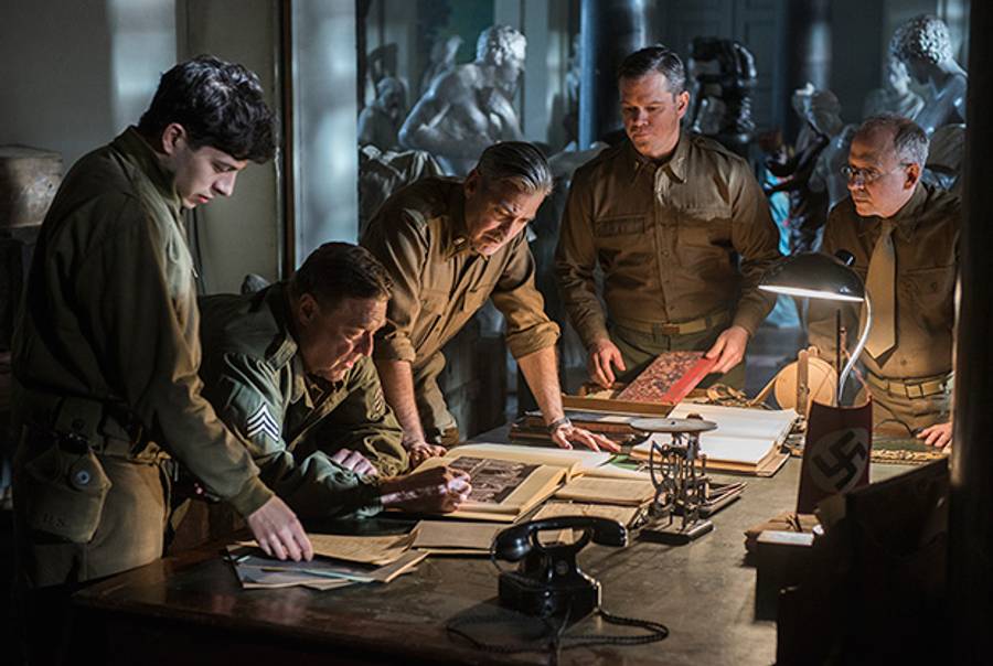 Left to right: Dimitri Leonidas, John Goodman, George Clooney, Matt Damon, and Bob Balaban in The Monuments Men.(Claudette Barius/Sony Pictures)