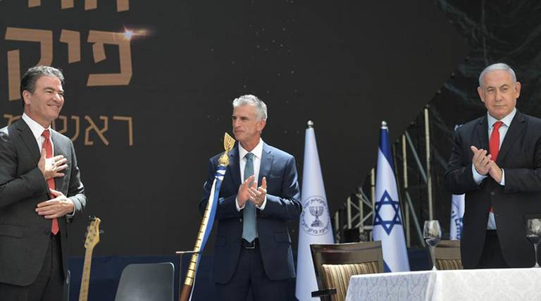 Israeli Prime Minister Benjamin Netanyahu, at right, and outgoing head of Mossad Yossi Cohen, left, attend the oath-taking ceremony of David Barnea, at center, as the new head of Israeli national intelligence, June 1, 2021