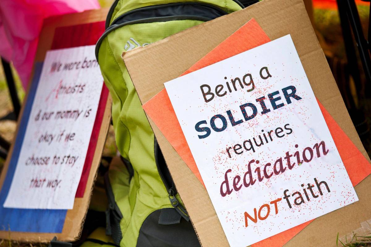 Signs in support of atheism on display during the Rock Beyond Belief festival at Fort Bragg army base in North Carolina on March 31, 2012
