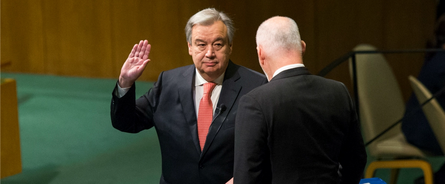 Antonio Guterres (L) is sworn in as UN secretary general by the president of the General Assembly Peter Thomson at the United Nations in New York, December 12, 2016. 