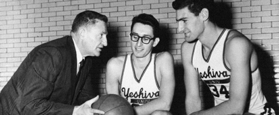 Coach Red Sarachek, right, with his players.