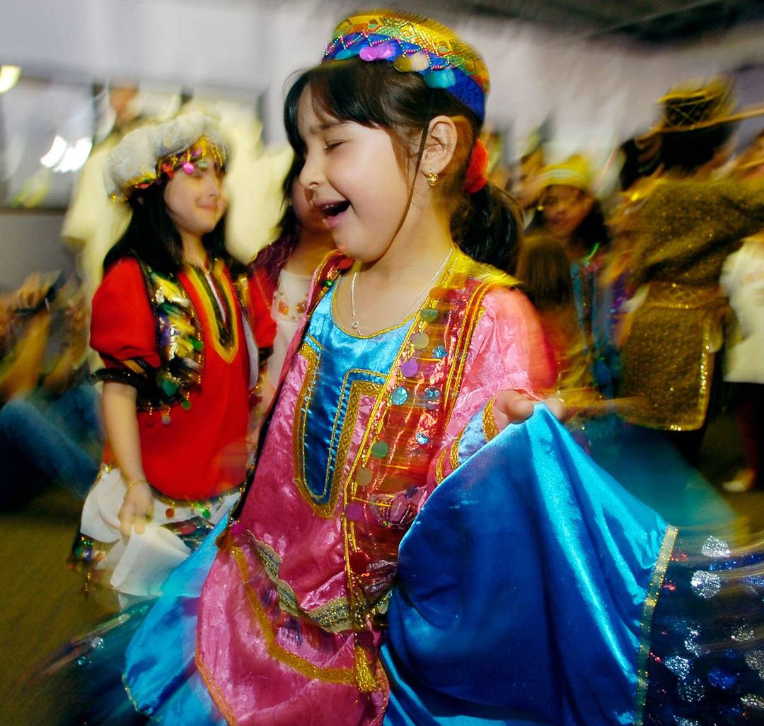 Children dance at a Nowruz celebration in Lafayette, Colorado