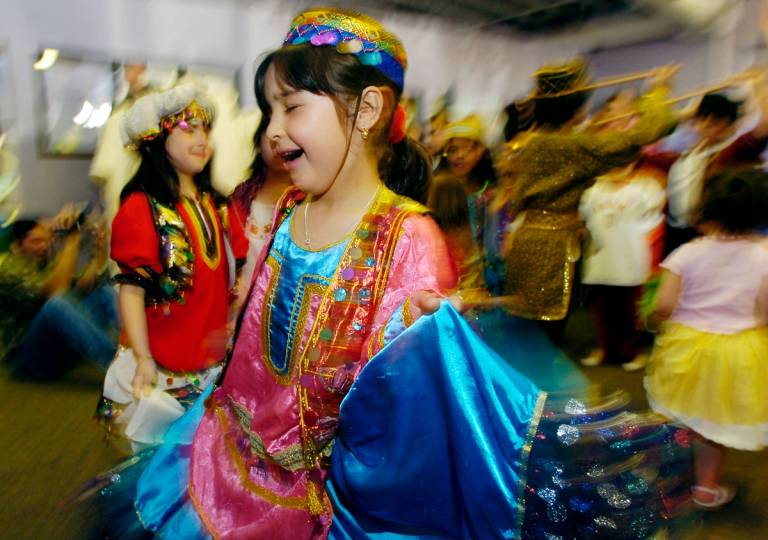 Children dance at a Nowruz celebration in Lafayette, Colorado