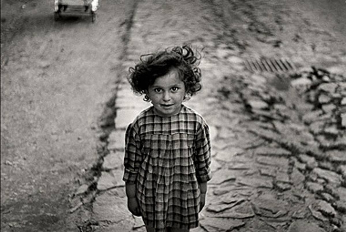 Girl in plaid dress, Mukacevo, ca. 1935-38. Unpublished.(Roman Vishniac © Mara Vishniac Kohn, courtesy the International Center of Photography)