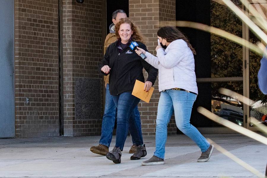 Jenny Cudd, a 37-year-old flower shop owner from Texas, wore a bulletproof hoodie sweatshirt to the January 6 riot at the Capitol. She is seen here leaving court.