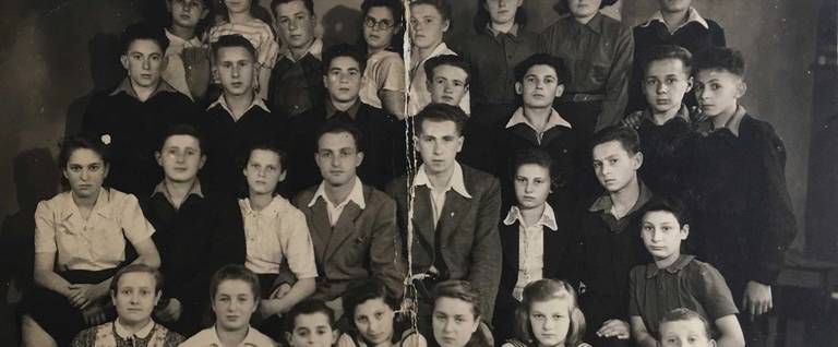 The Children's Home in Selvino, winter 1945-46. Menachem Krigel appears at the far right in the row second from the back.