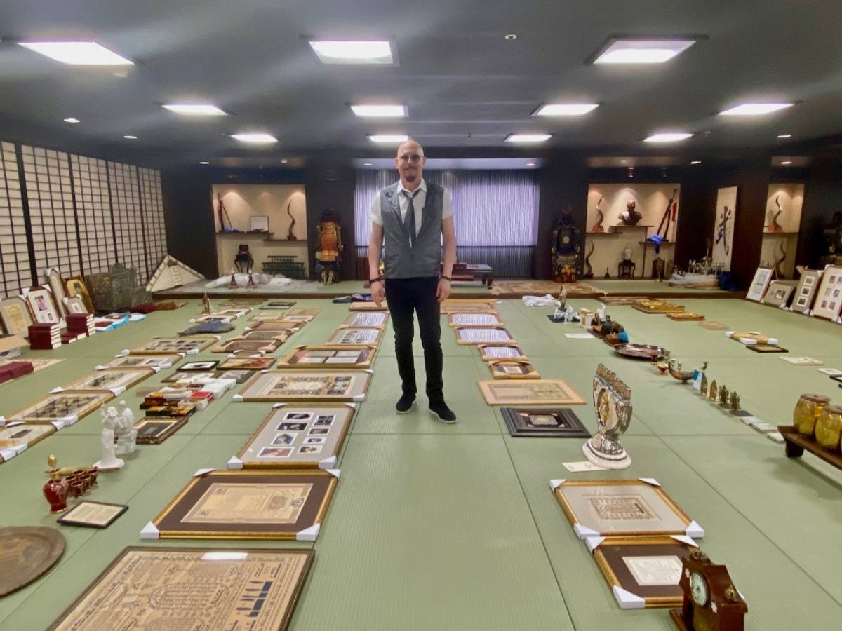 Jeffrey Schwartz with items from his personal Judaica collection, which will make up the Judaica museum at the community center