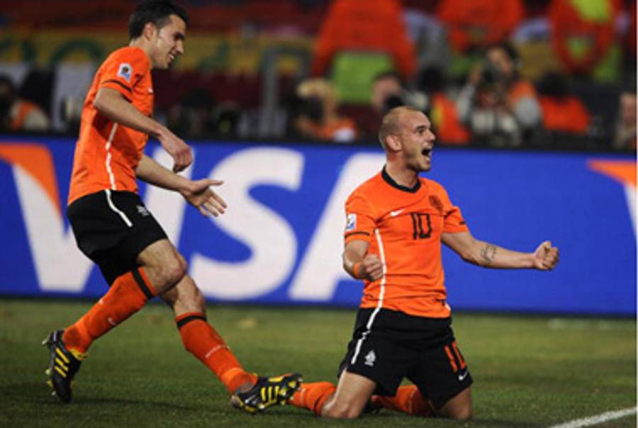 Dutch midfielder Wesley Sneijder celebrates a goal against Brazil last week.(Fabrice Coffrini/AFP/Getty Images)