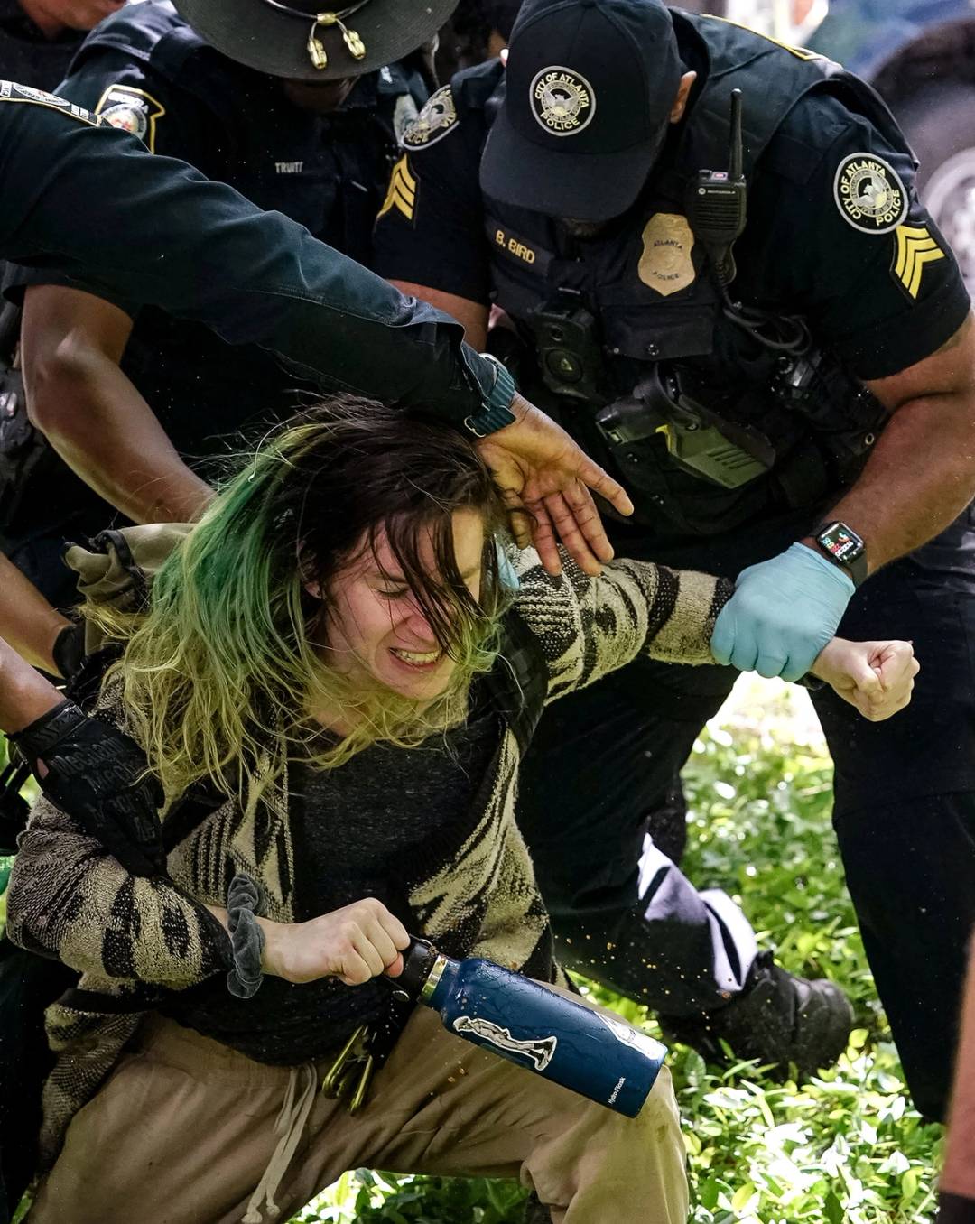 Police officers arrest a demonstrator during a protest against the war in Gaza at Emory University on April 25, 2024