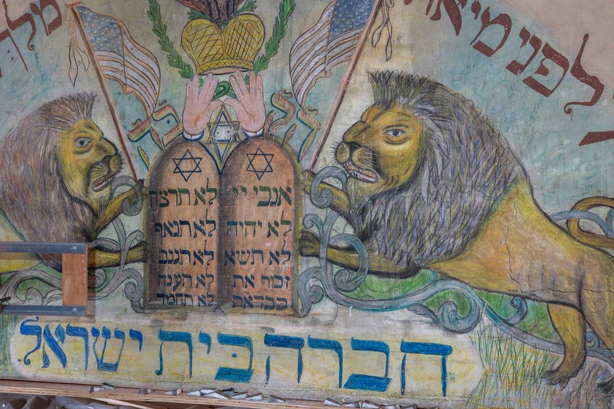 A detail of the mural during its restoration