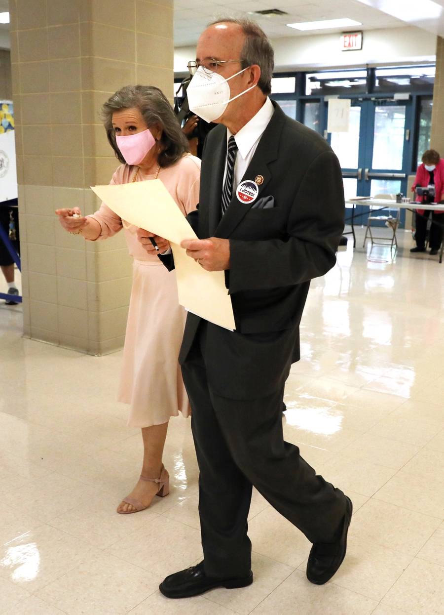 Rep. Eliot Engel, D-N.Y., votes with his wife, Patricia, at a school near their home in Riverdale in the Bronx, June 23, 2020