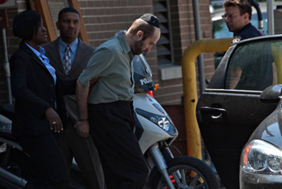 Levi Aron in custody in Brooklyn today.(Michael Kirby Smith/City Room)