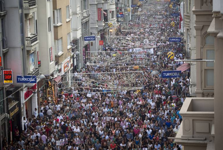 Turkish people gather during an anti-government protest on Taksim square in Istanbul on June 29, 2013. (OREN ZIV/AFP/Getty Images)