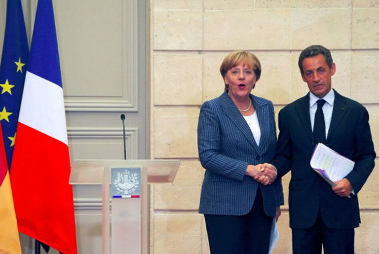 Chancellor Angela Merkel of Germany and President Nicolas Sarkozy of France last month.(Trago/Getty Images)