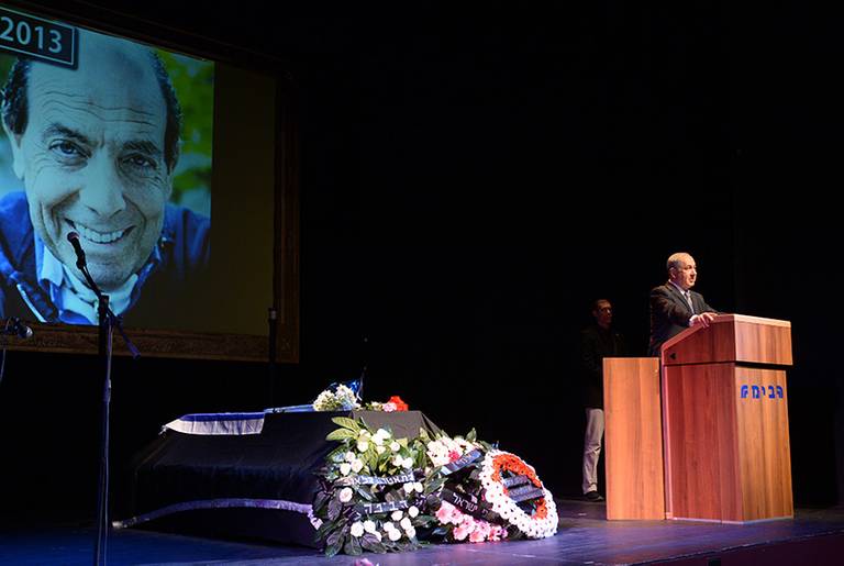 Benjamin Netanyahu speaks at the memorial service for Sefi Rivlin on Dec. 4, 2013.(Haim Zach/GPO via Flickr)