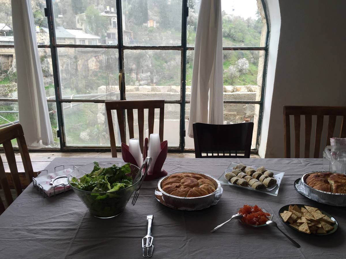 Efrat Giat’s table set for tourists who come to her Ein Kerem home to learn her family’s story of immigration to Israel from Yemen. She makes cheeses from the milk of her goats, and also traditional Yeminite bread. (Photo: Sara Toth Stub)