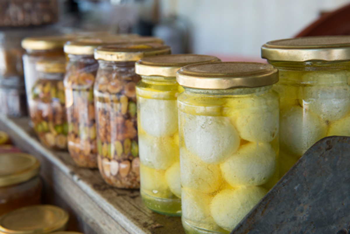 Jars of labneh balls in olive oil, and nuts in honey at the Druze farmers market next to Nabi Ya’furi (Photo: Efrat Moskovich)