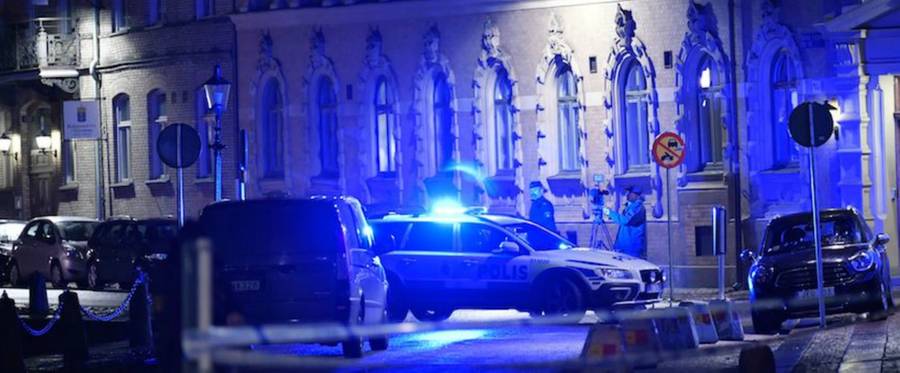 Police outside of a fire-bombed synagogue in Gothenburg, Sweden in December