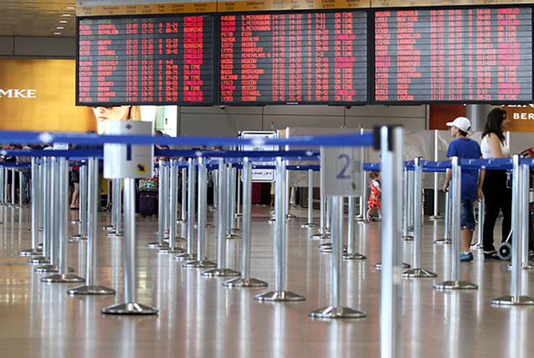A departure time flight board displaying various cancellations at Ben Gurion International airport near Tel Aviv on July 23, 2014. (GIL COHEN MAGEN/AFP/Getty Images)