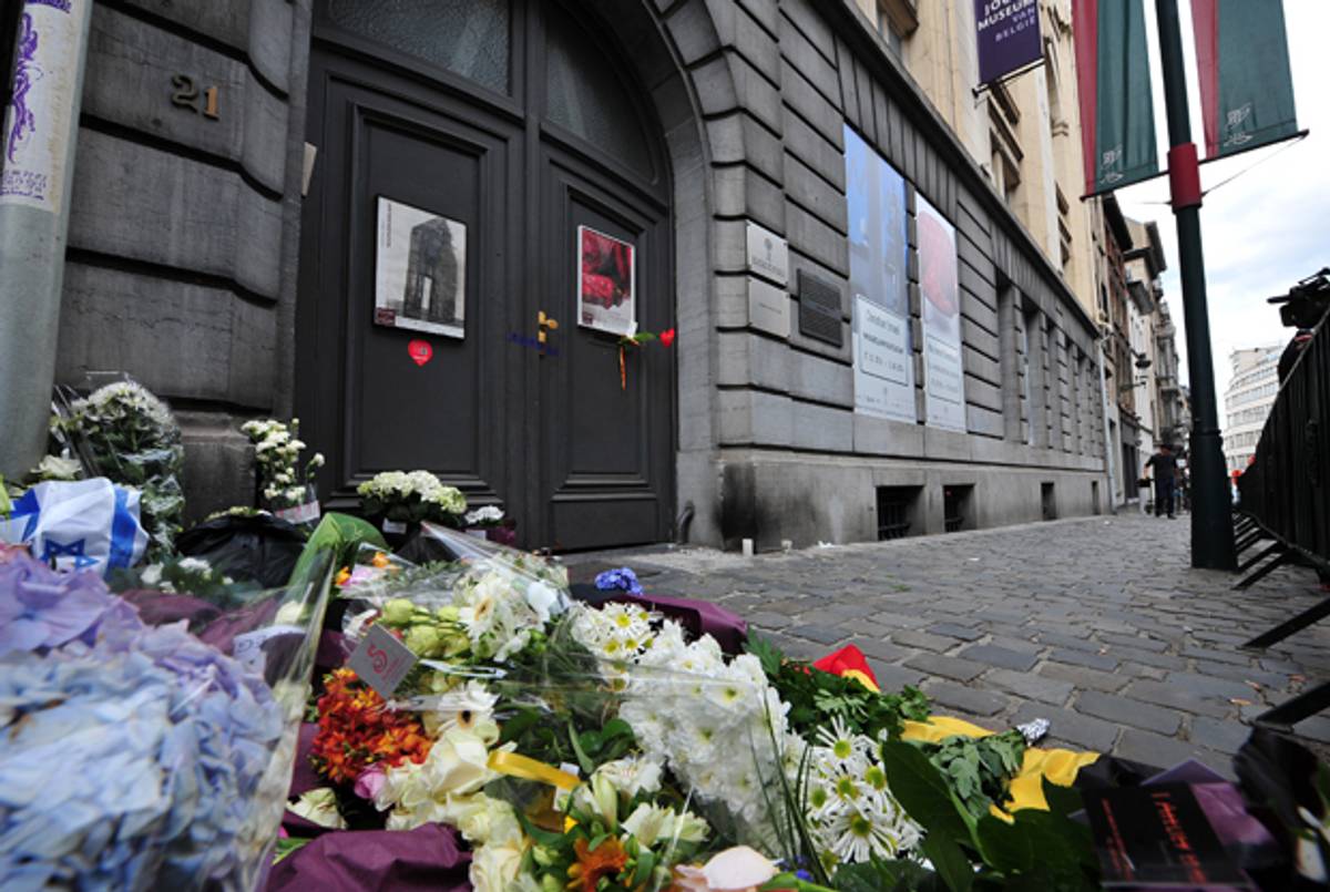 Flowers are pictured at a makeshift memorial at the entrance of the Jewish Museum in Brussels, on May 25, 2014, where a deadly shooting took place the day before. (GEORGES GOBET/AFP/Getty Images)