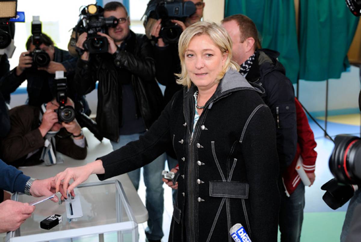 Marine Le Pen files a blank ballot yesterday.(Denis Charlet/AFP/GettyImages)