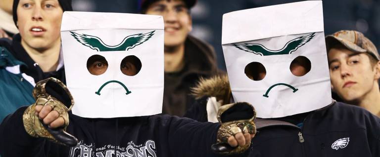 Philadelphia Eagles fans show their displeasure after losing to the Carolina Panthers 30-22 loss at Lincoln Financial Field on November 26, 2012 in Philadelphia, Pennsylvania.