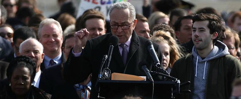 Senate Minority Leader Charles Schumer (D-NY) speaks to Washington-area students during a rally at the U.S. Capitol to urge Congress to take action against gun violence on March 14, 2018 on Capitol Hill in Washington, DC. It was one month ago today that a gunman killed 17 people at Marjory Stoneman Douglas High School in Parkland, Florida. 