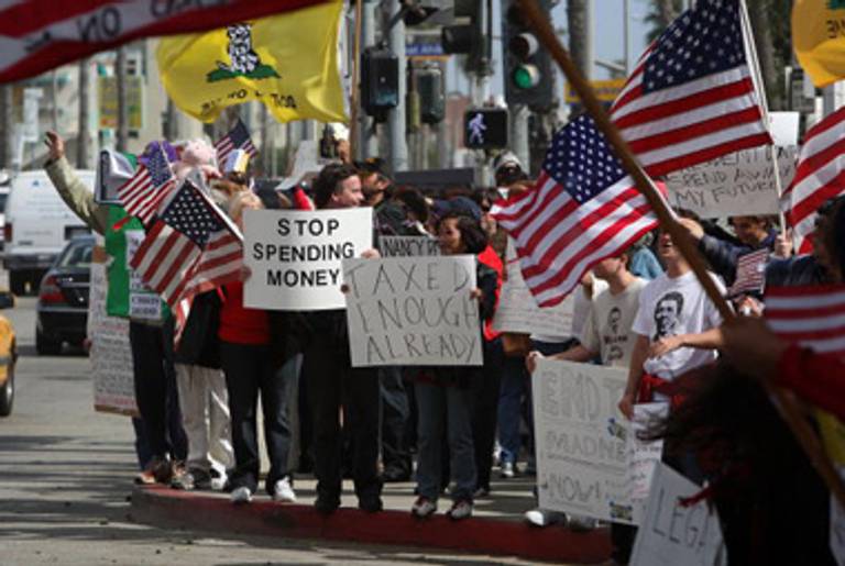 Demonstrators gather at an American Family Association (AFA)-sponsored T.E.A. (Taxed Enough Already) Party to protest taxes and economic stimulus spending on the last day to file state and federal income tax returns, April 15, 2009 in Santa Monica, California.(David McNew/Getty Images)