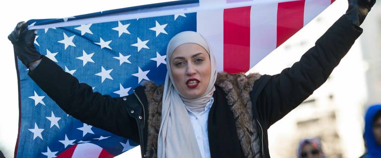 A woman named Zeina, who did not want to give her last name, takes part in a protest against U.S. President Donald Trump's recent action on refugees entering the U.S., Washington, D.C., February 4, 2017. 