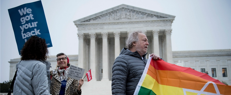 People gather outside the U.S. Supreme Court before Masterpiece Cakeshop vs. Colorado Civil Rights Commission is heard on Dec. 5, 2017 in Washington, D.C.
