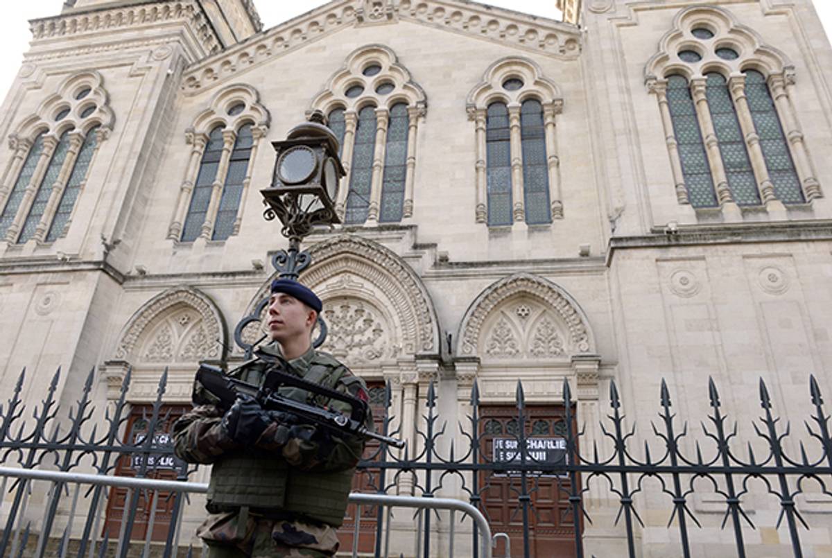 A soldier stands guard outside the Great Synagogue in Bordeaux on January 15, 2015. (JEAN PIERRE MULLER/AFP/Getty Images)