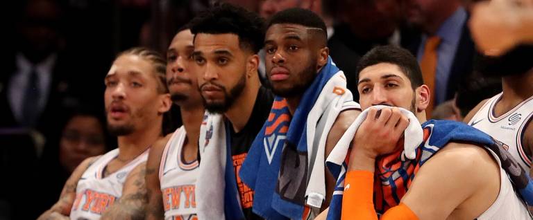 The New York Knicks bench reacts to the loss to the Golden State Warriors at Madison Square Garden on Feb. 26, 2018, in New York City.