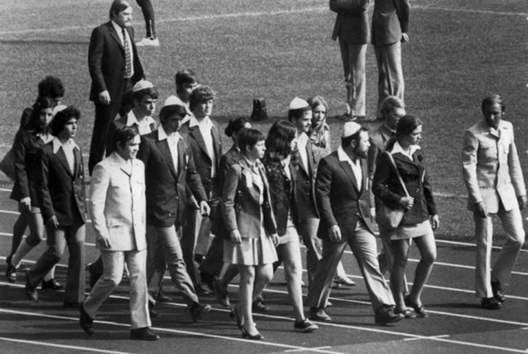 Members of the Israeli team at the Munich Olympic stadium Sept. 6, 1972, for the memorial ceremony honoring their countrymen who were killed by Palestinian terrorists. (AFP/Getty Images)
