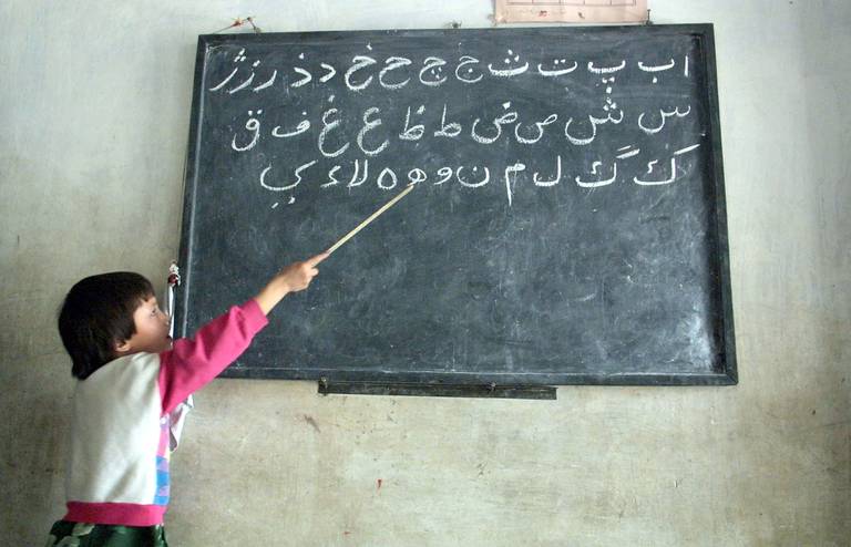 A young student at a Farsi language class, Pakistan, 2001