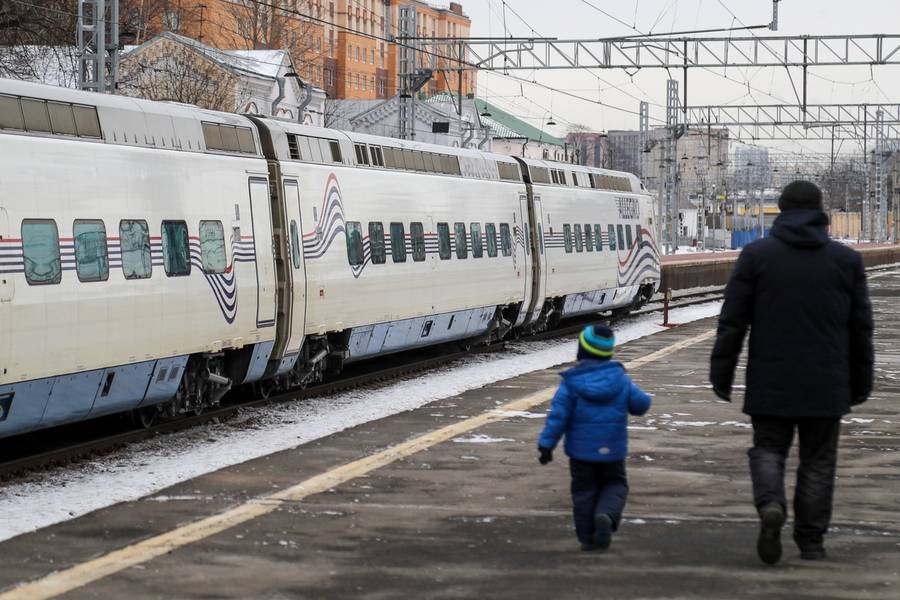 An express train stands at Finland Station in St. Petersburg, Russia, on March 8, 2022, before departing for Helsinki. Finnish Railways has expanded its train service from St. Petersburg to Helsinki to accommodate the increasing number of Russians leaving their country.
