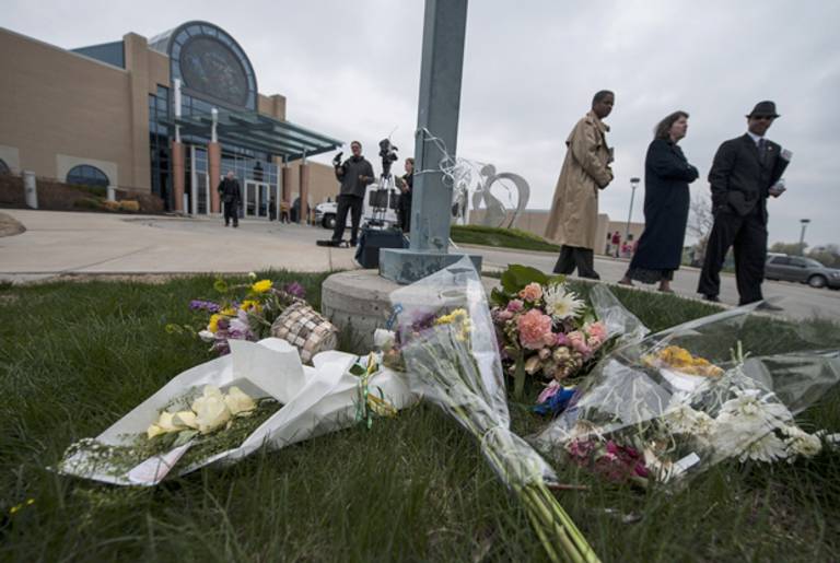 Crowds pass by a makeshift memorial following an interfaith service honoring victims of Sunday's shootings on April 17, 2014 at the Jewish Community Center of Greater Kansas City, in Overland Park, Kansas. (Julie Denesha/Getty Images)