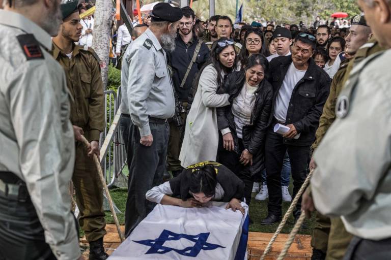 Cydrick Garin's family at his funeral at the Kiryat Shaul Cemetery in Tel Aviv on Jan. 25, 2024