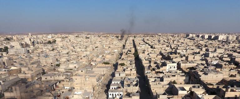 An aerial view of the buildings destroyed by the Assad Regime forces and Russian Army in the Tariq al-Bab neighborhood of Aleppo, Syria on October 2016. 
